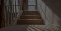image of a clean carpeted
  staircase